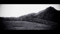James Fisher as Jonah, Climbing the Mountain by a dry stone wall at Grasmere Lake District, October 2011 - Black Smoke Rising